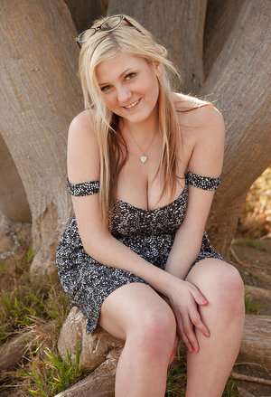 18 year old beauty Agnes takes great care in flaunting perky tits in the nude