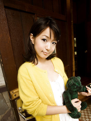 Tatted girl Felicity Feline shows her flexibility in a revealing bodystocking