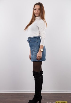 Charlotte Cross is tied up and fitted with a big gag before being masturbated