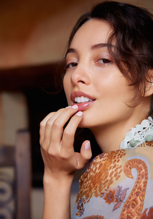 18 year old girl Katie Lewis stands naked after undressing in her bedroom