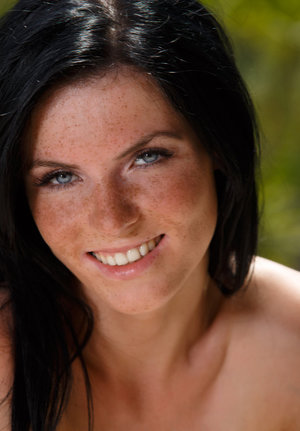 18 year old girl Agnes uncovers her perky tits as she gets completely naked