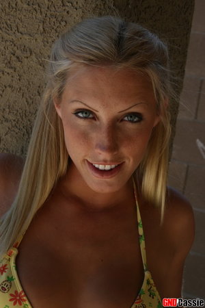 18 year old female Chloe Dash undressing on yoga mat on lawn