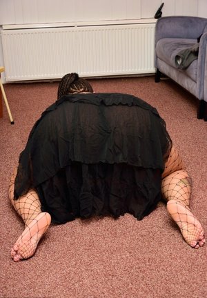 18 year old female Chloe Dash undressing on yoga mat on lawn