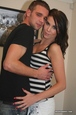 18 year old female Doris G slips off her underwear to pose naked on her bed