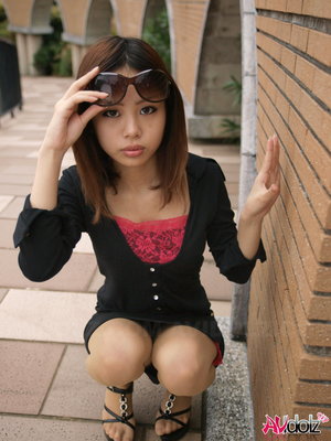 Hot Japanese teen Honoka strikes great poses in and out of lingerie