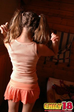 18 tear old schoolgirl Tiff Bannister takes selfies while disrobing in bedroom