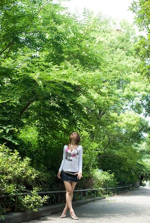 Brunette teen Eniko rips open pantyhose for public sex in the bushes