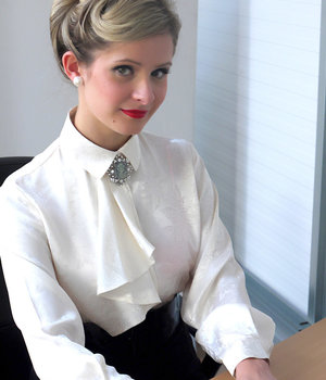 1 dark haired female tortures another during lezdom play in concrete cellar